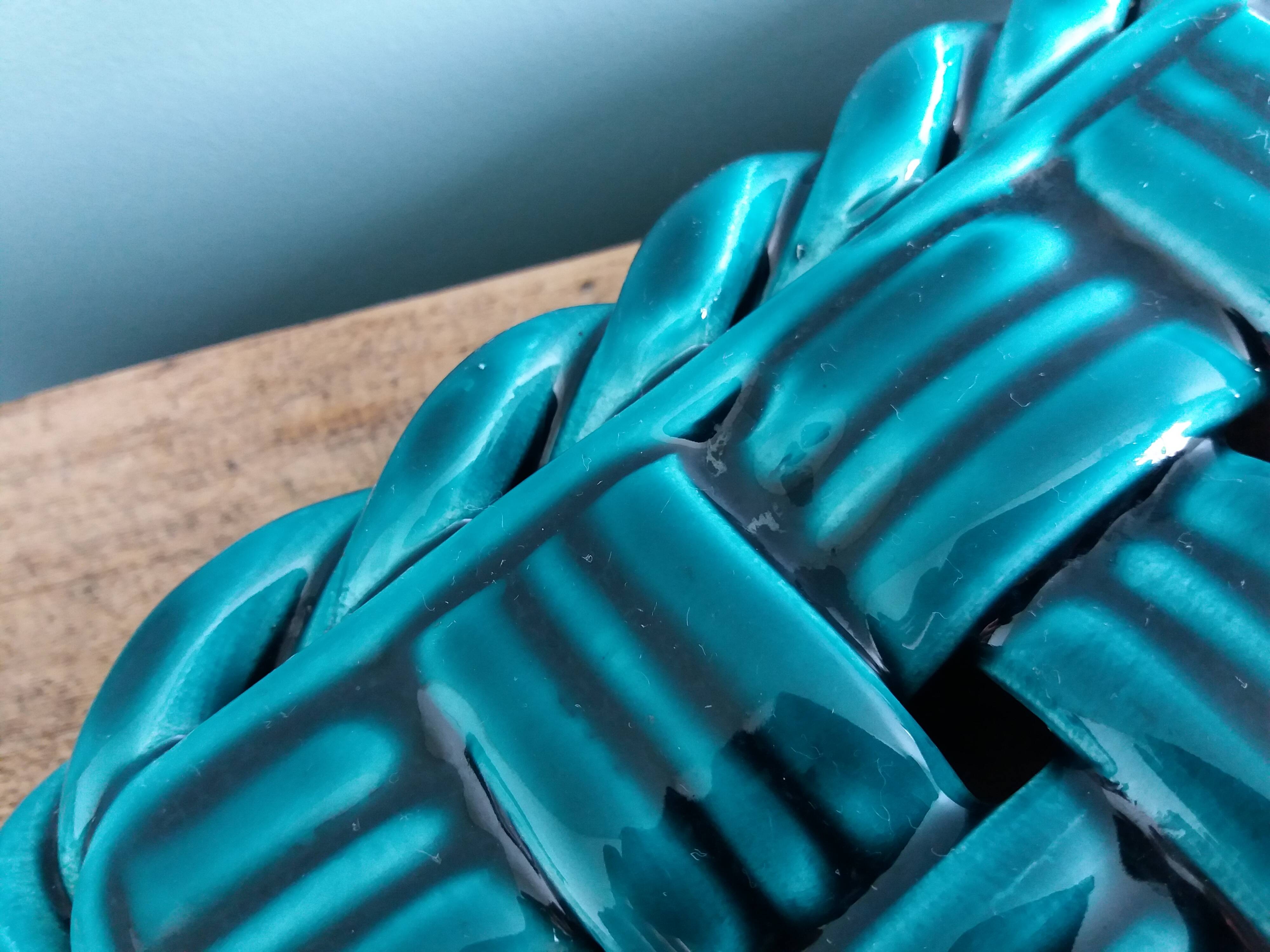 Emerald green braided slip trivet and bottle holder, knife holder