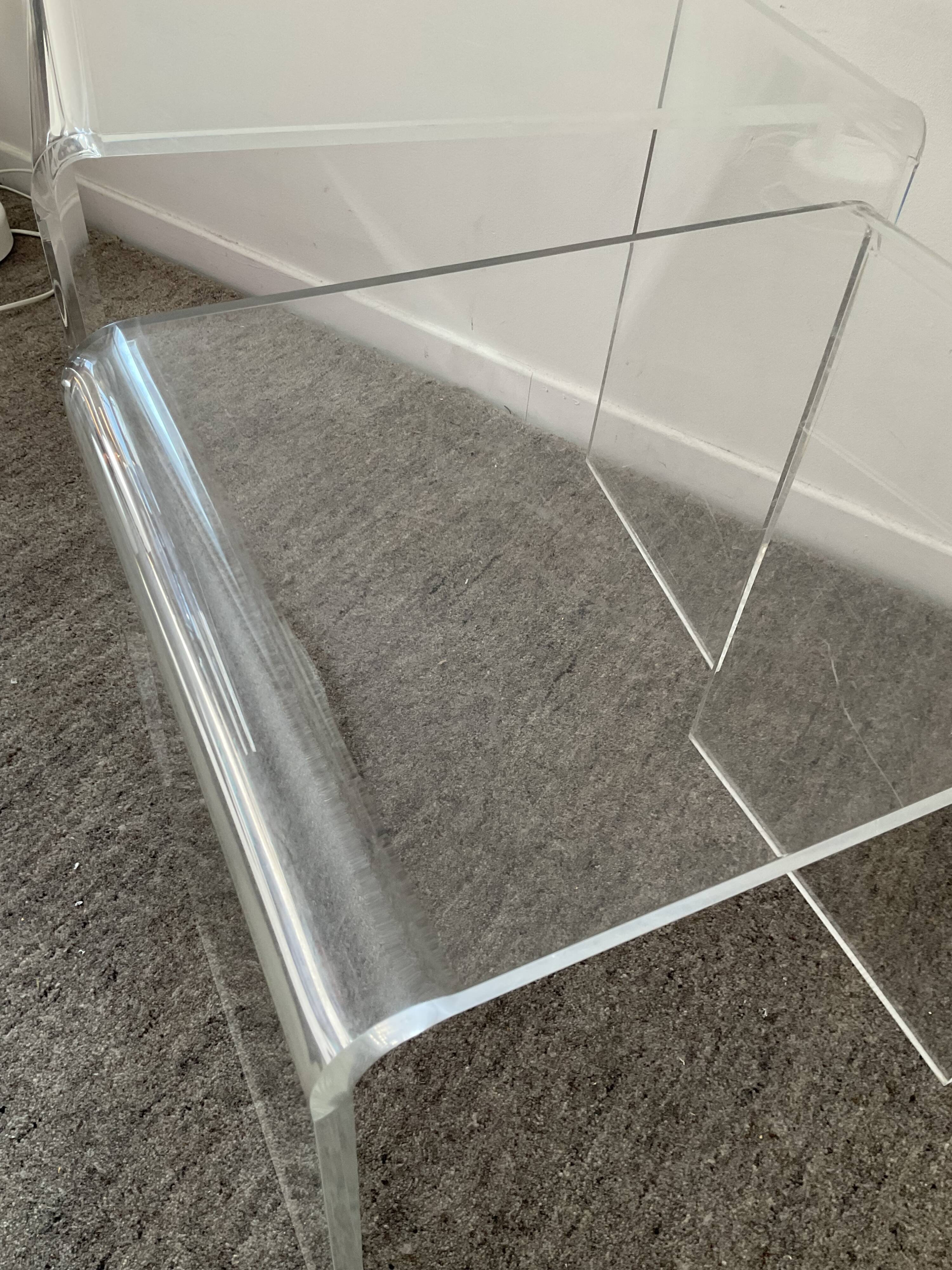 Duo of pull-out tables in plexiglass 70s