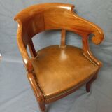Fauteuil de bureau garni de cuir début XIXe siècle,