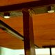 Rectangular wooden table, legs and spacer in hammered ironwork, 60s