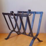 Brutalist magazine rack in forged steel, 1950.