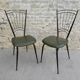 Pair of black metal chairs and khaki green skai, 60s