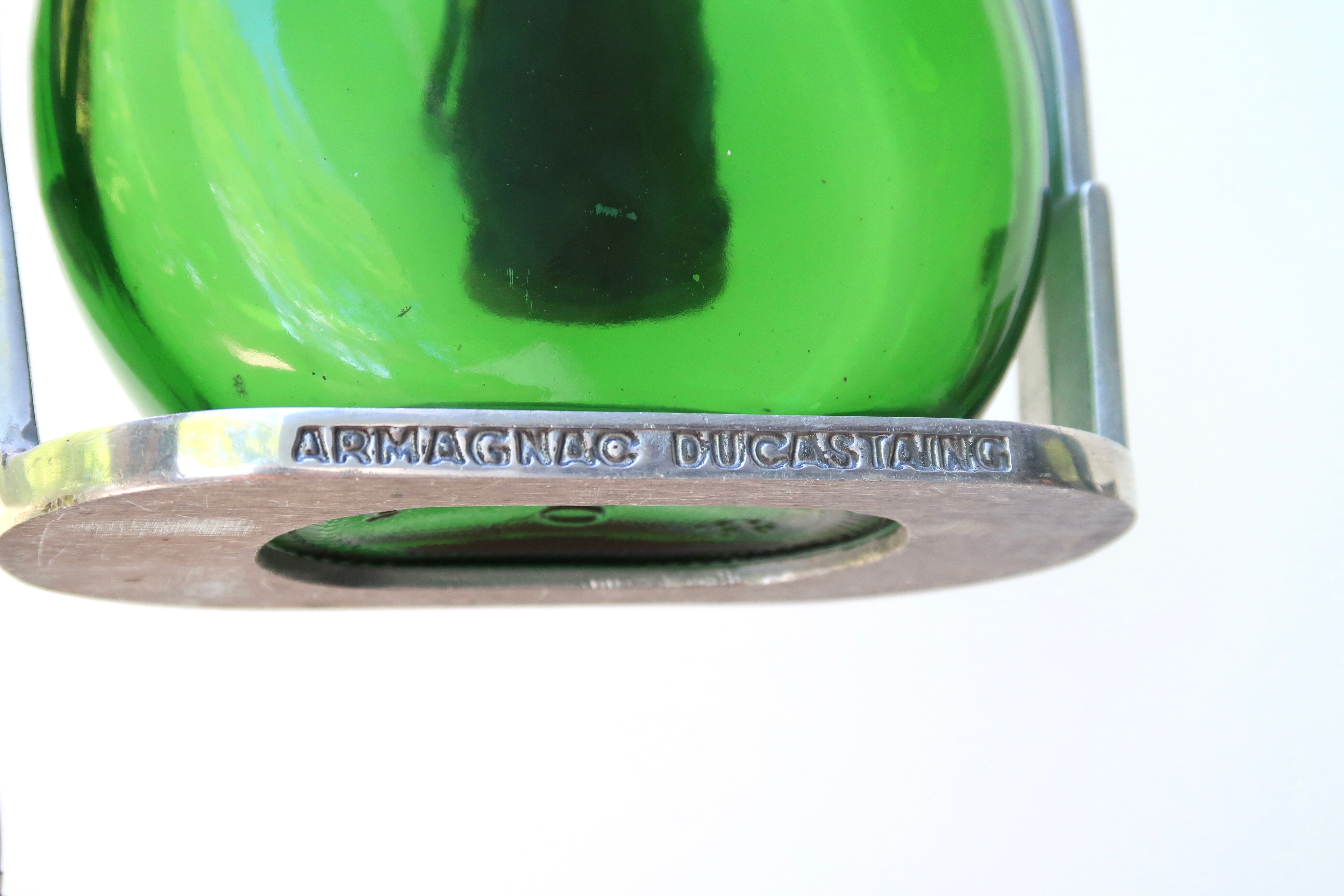 Armagnac Ducastaing bottle lamp and its stirrup, 60s