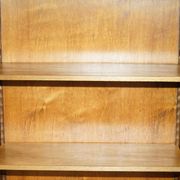 Pair of Sheraton Revival bookcases in satinwood, walnut, and yew.