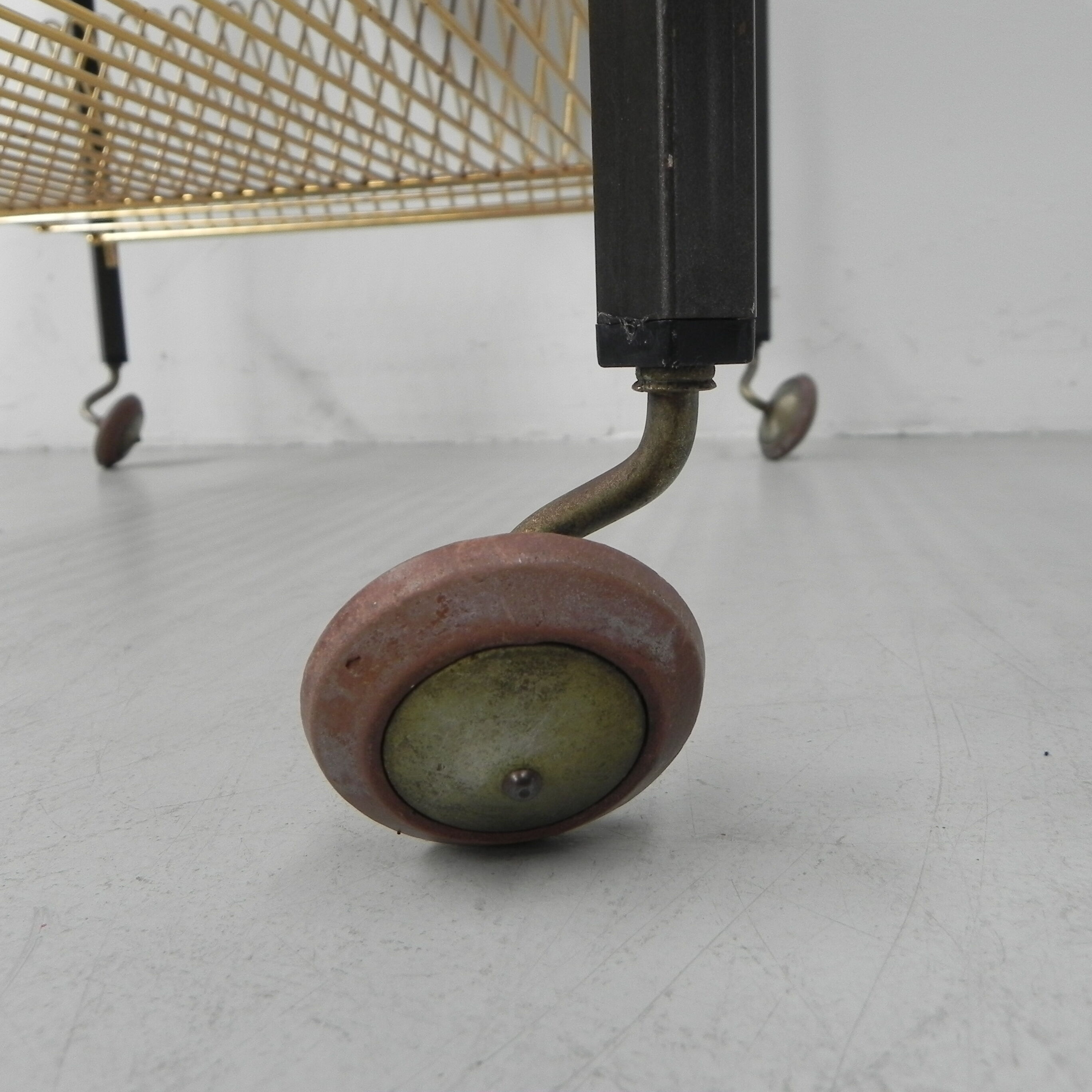 Vintage coffee table on castors with singles rack