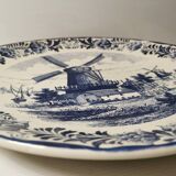 Plat en faïence delft à décor d'un moulin fin xixe début xxe diamètre 39 cm