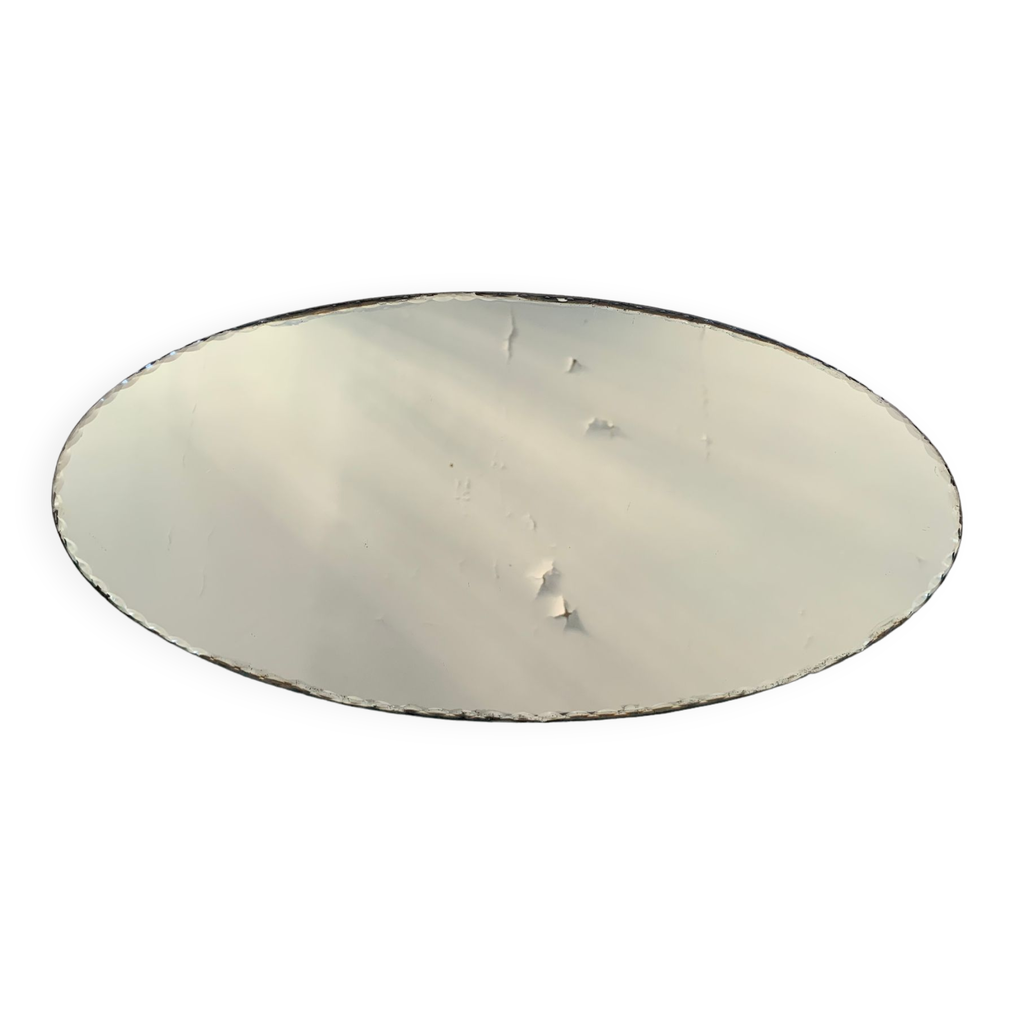 Old beveled oval mirror