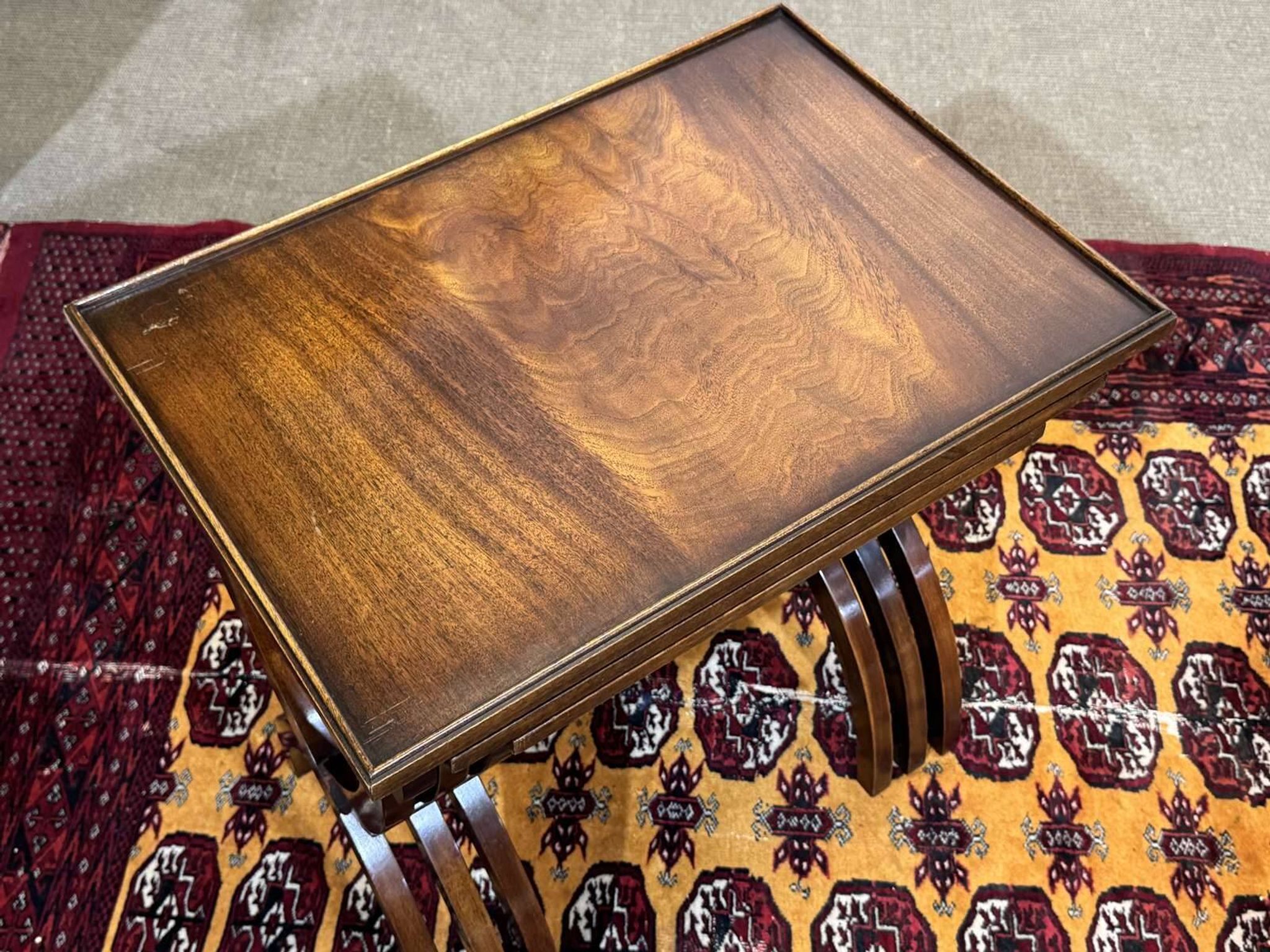 Set of English nesting tables in mahogany from the 1950s.