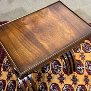 Set of English nesting tables in mahogany from the 1950s.