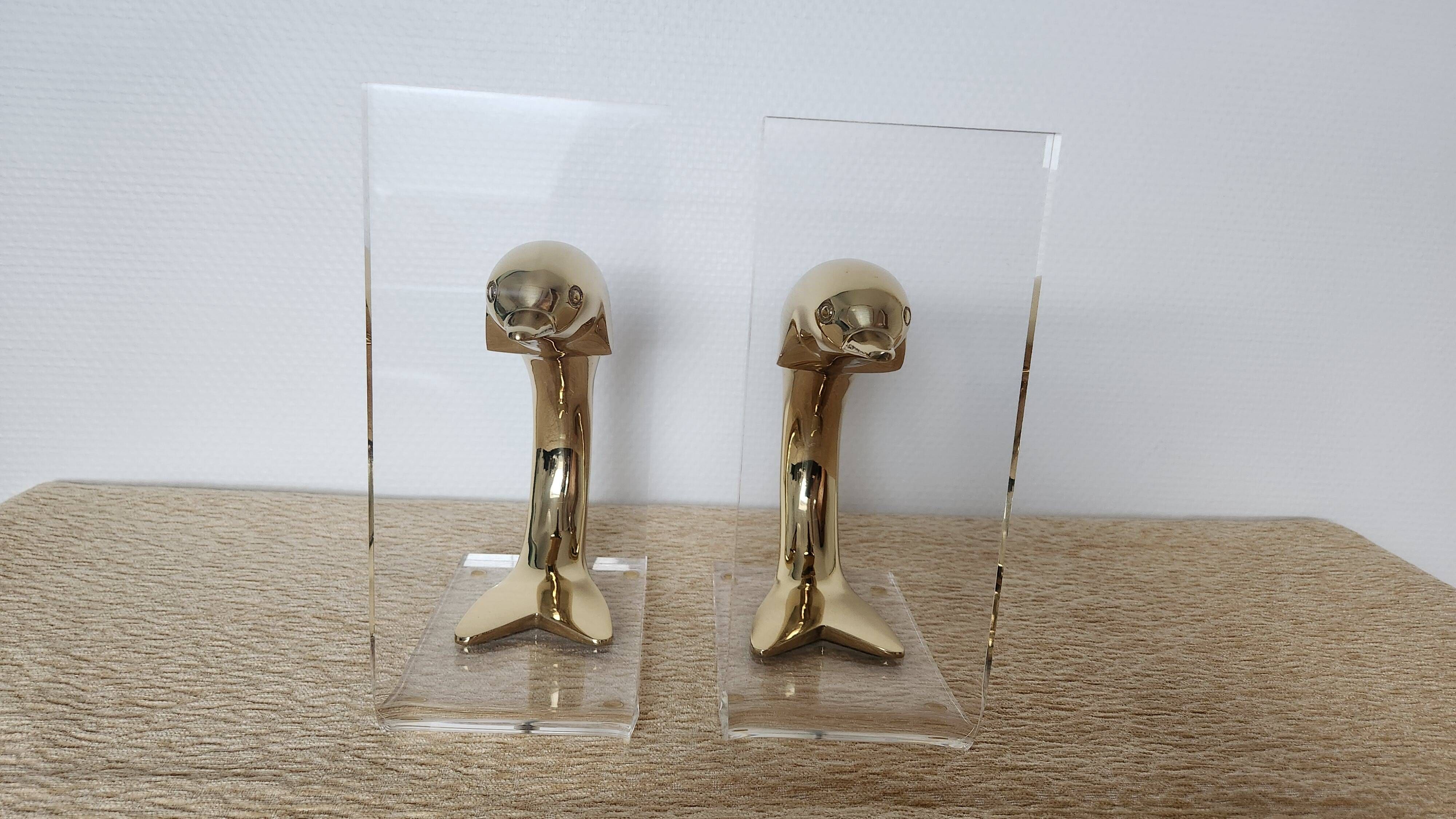 Dolphin bookends in gold metal and plexiglass – 1980s