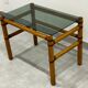 Table basse bois blond et verre fumé à ligatures cuir