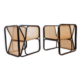 Pair of designer armchairs in curved wood and wicker