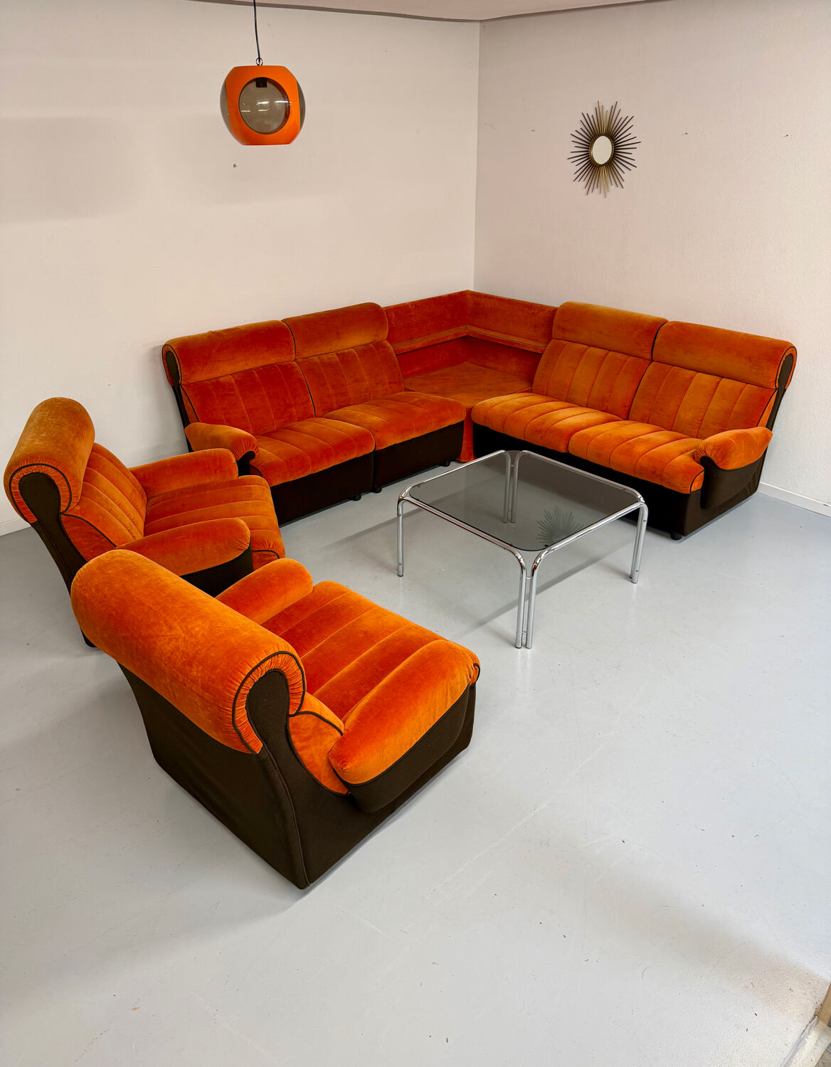 Modular vintage orange corner sofa, 1970s pop design.