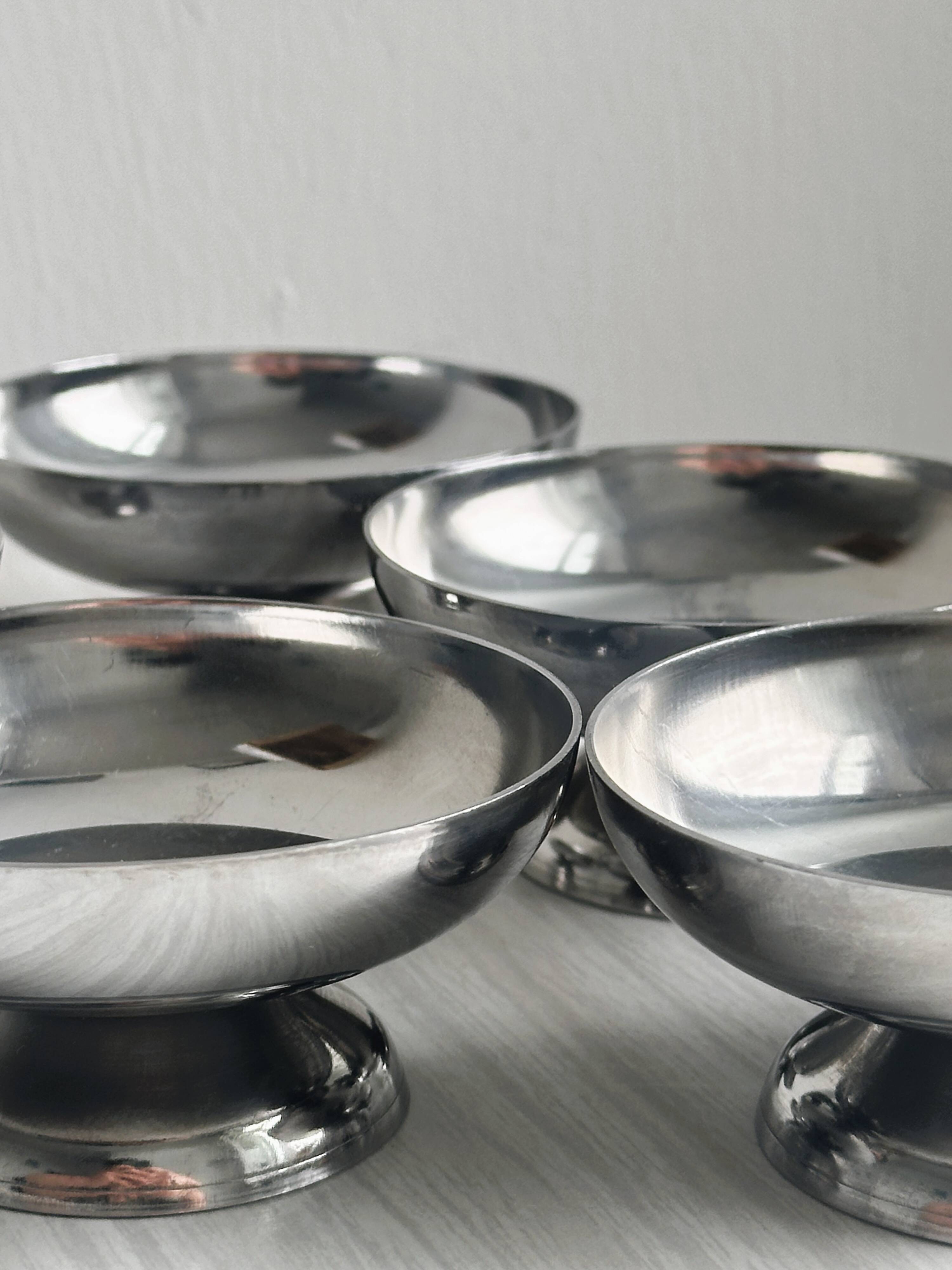 6 stainless steel dessert cups.