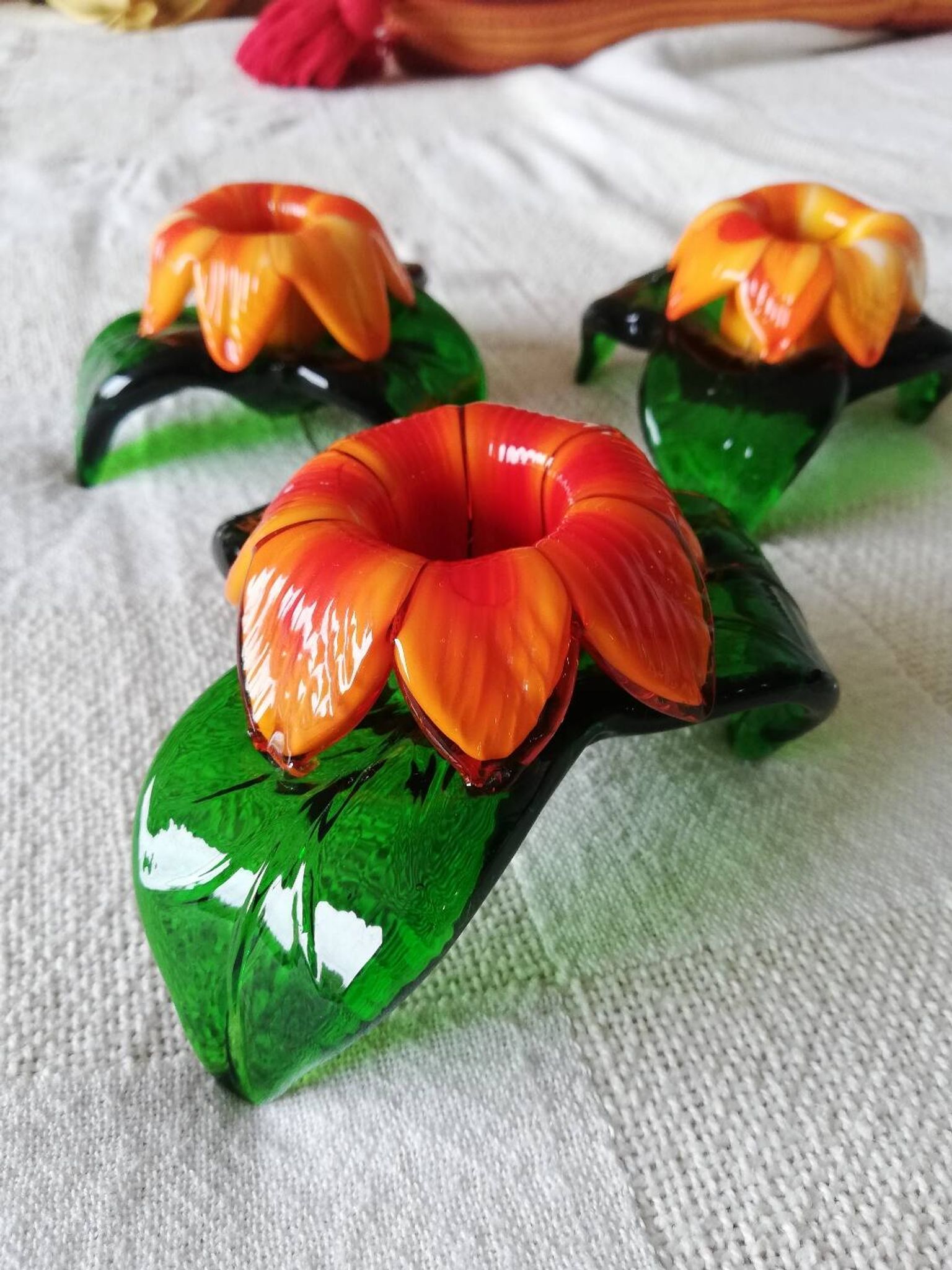 Lot of three Murano flower candle holders.