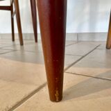 Extendable teak round table