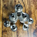 Modular chrome metal candle holders by Nagel & Stoffi. Set of 4