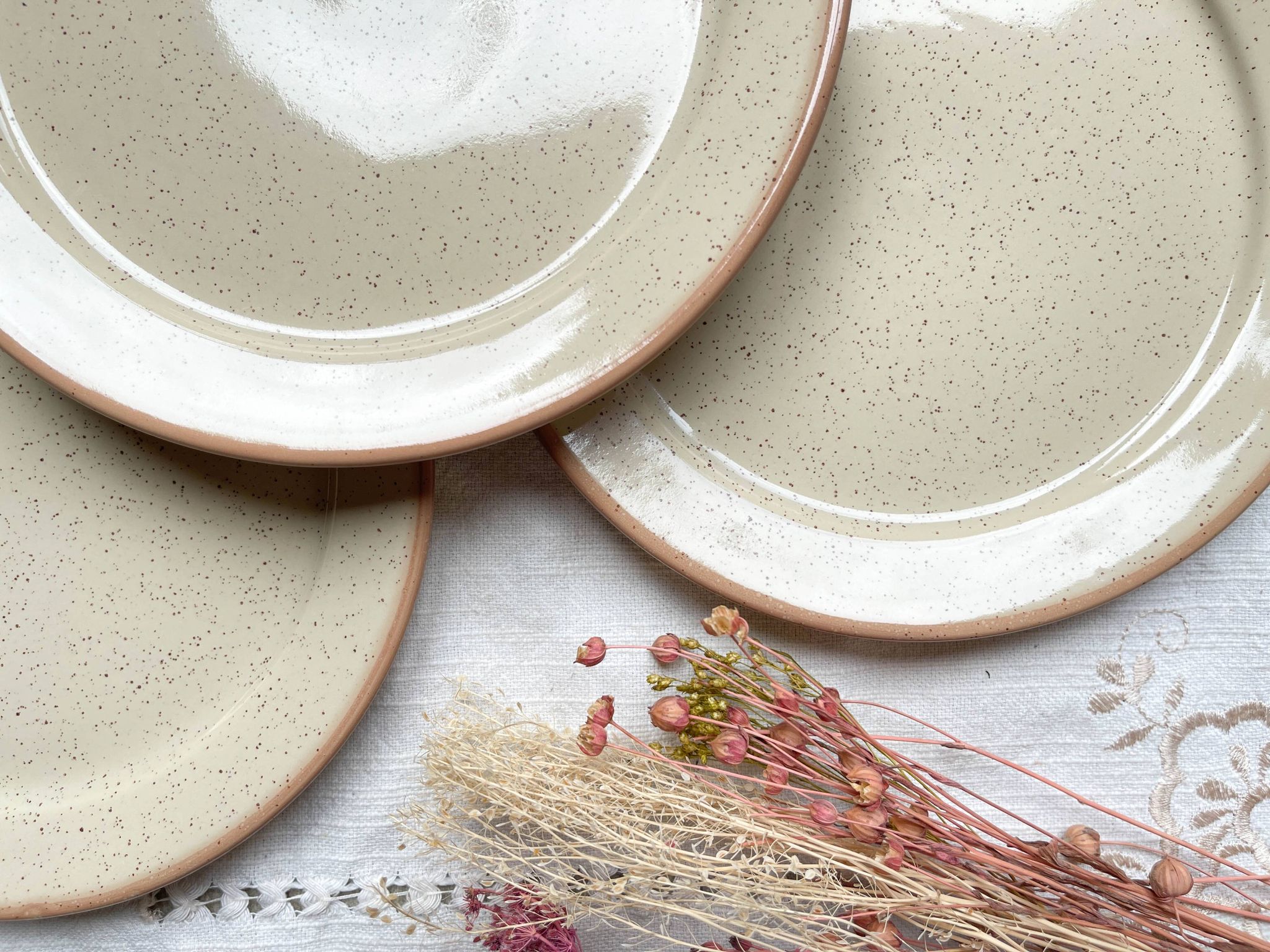 4 Small plates in speckled stoneware, Tulowice style, mid-century, 20th century