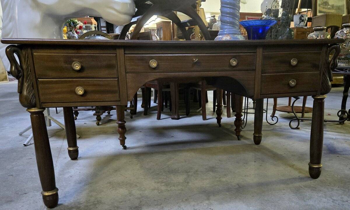 Empire-style minister's desk with swan necks in mahogany.
