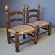 Ensemble de 2 chaises basses avec assise en paille, années 1950.