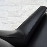 1970s, Danish highback armchair, black artificial leather, teak wood legs.