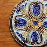 Dessous de bouteille / dessous de plat faïence en barbotine art nouveau fin XIXe début XXe