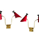 Pair of brass wall lights, red diabolo metal lampshades, circa 1950