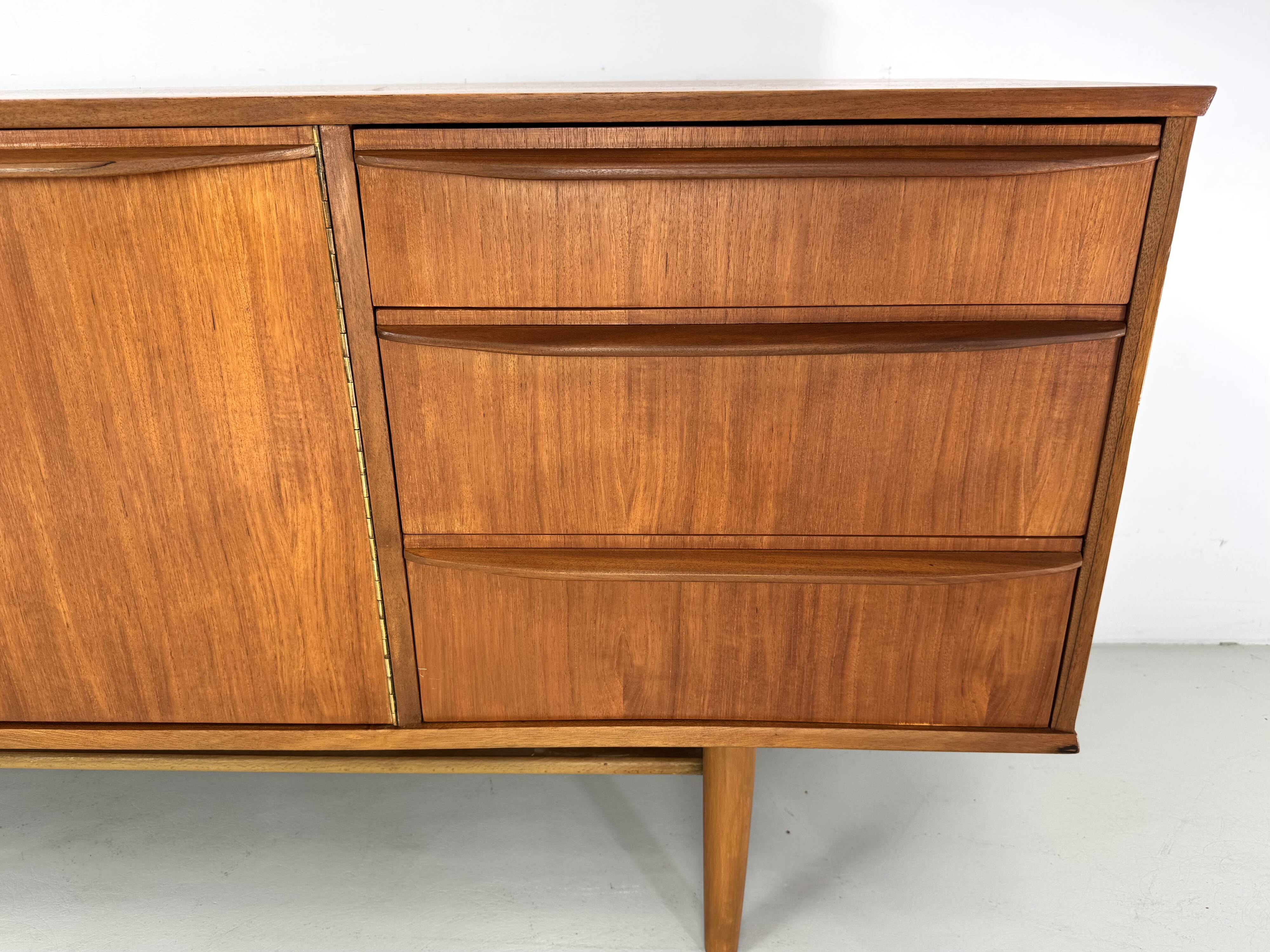 Beautiful vintage sideboard with a sleek design from the 60s.