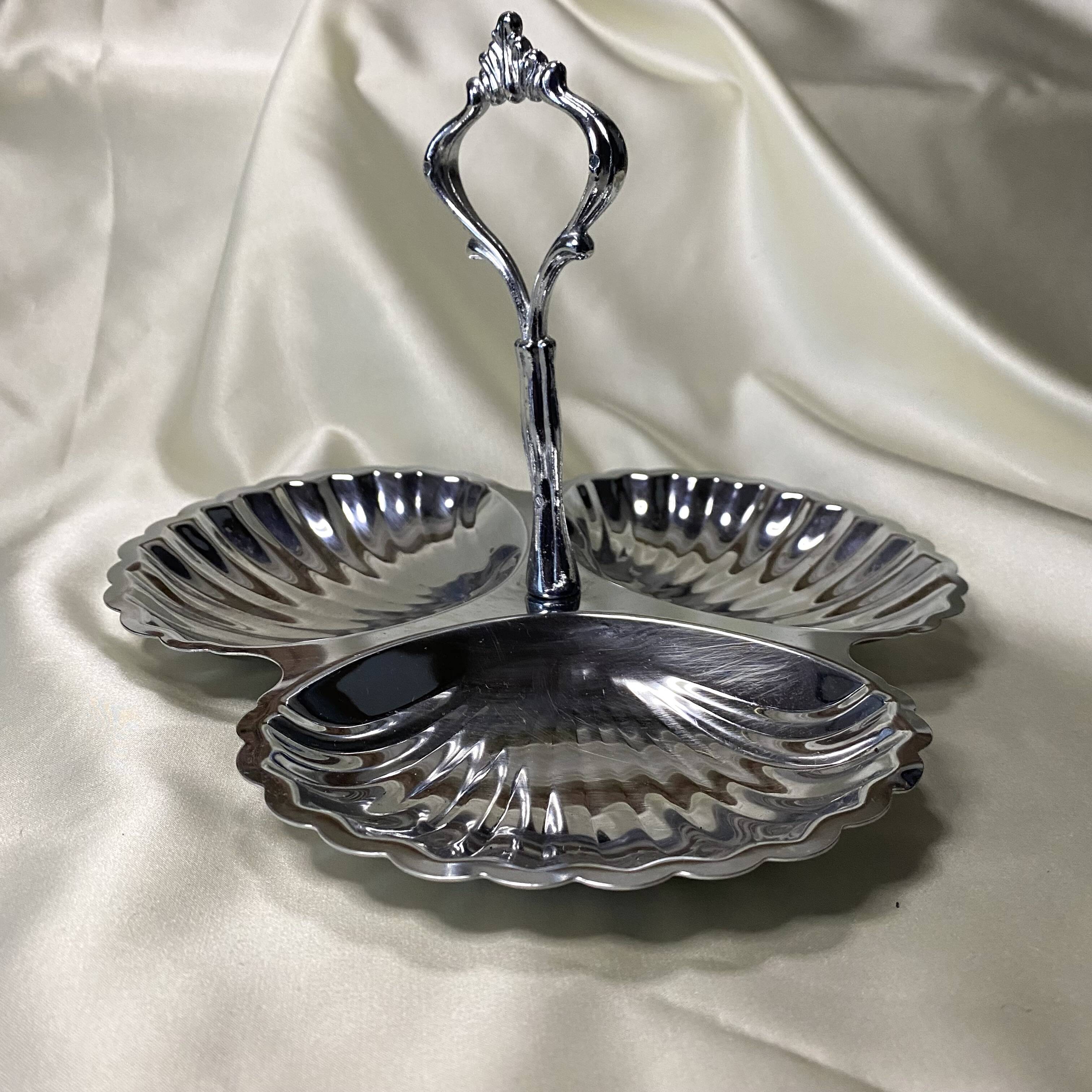 Stainless steel serving platter in the shape of seashells