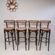 4 curved wood and cane bar stools