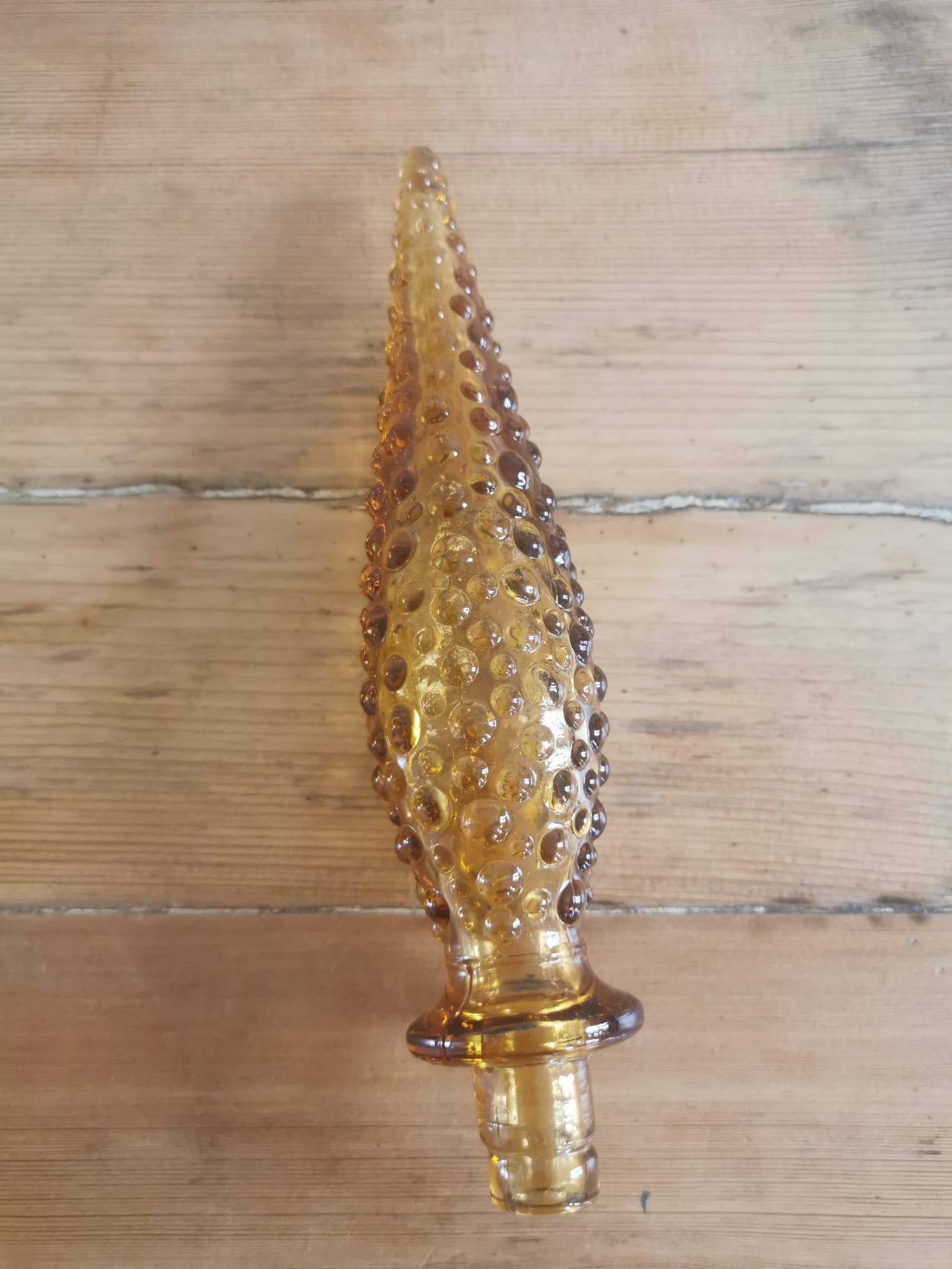 Amber-colored empoli glass decanter