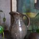 Potter's pitcher Art-popular in old enamelled earth