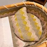 Vintage rattan doll basket