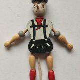 Articulated wooden puppet