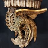 Pair of polychromed wooden wall mounts