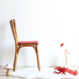 Bistro chair with bars of the 50s in wood and imitation red leather