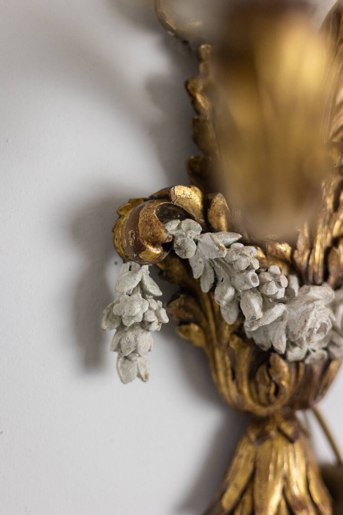 Pair of Louis XVI style wall lights in gilded and lacquered wood. Circa 1900.