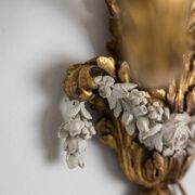 Pair of Louis XVI style wall lights in gilded and lacquered wood. Circa 1900.