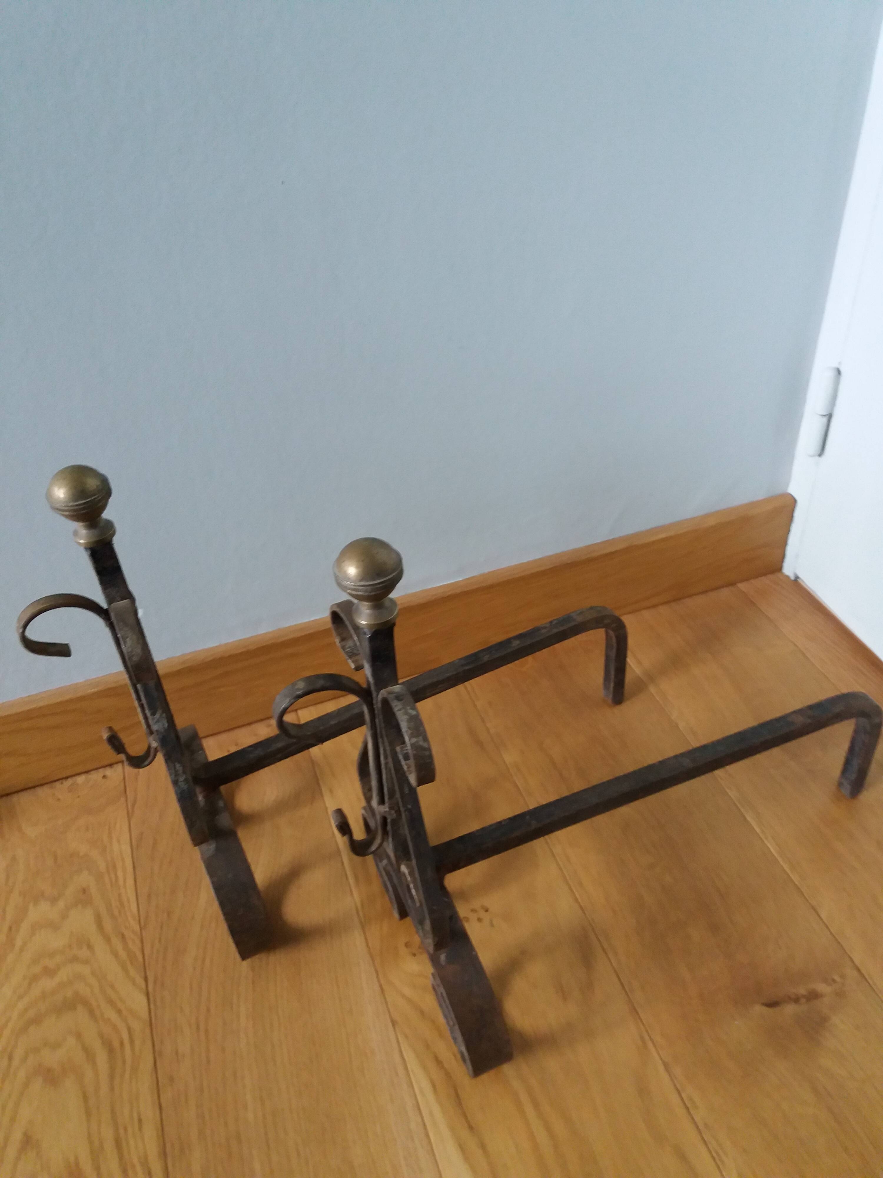 Chenets tête boule bronze doré