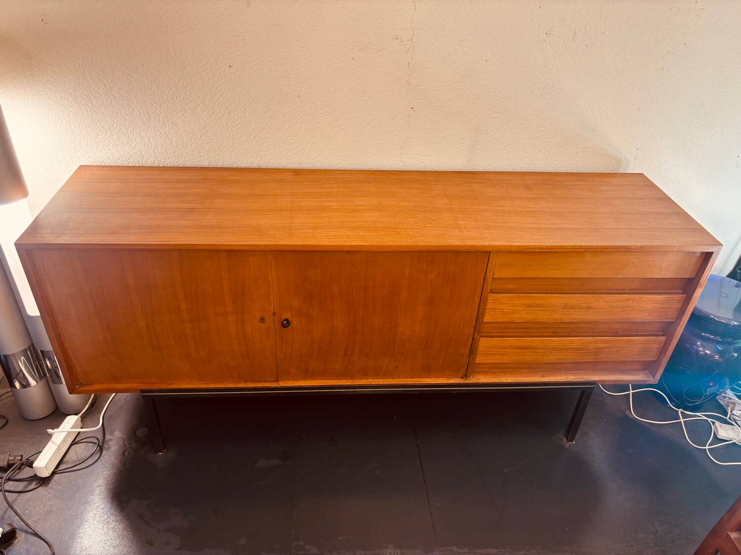 Scandinavian sideboard with 2 doors and 3 drawers in teak.