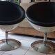 Pair of vintage white ball and black imitation leather swivel armchairs