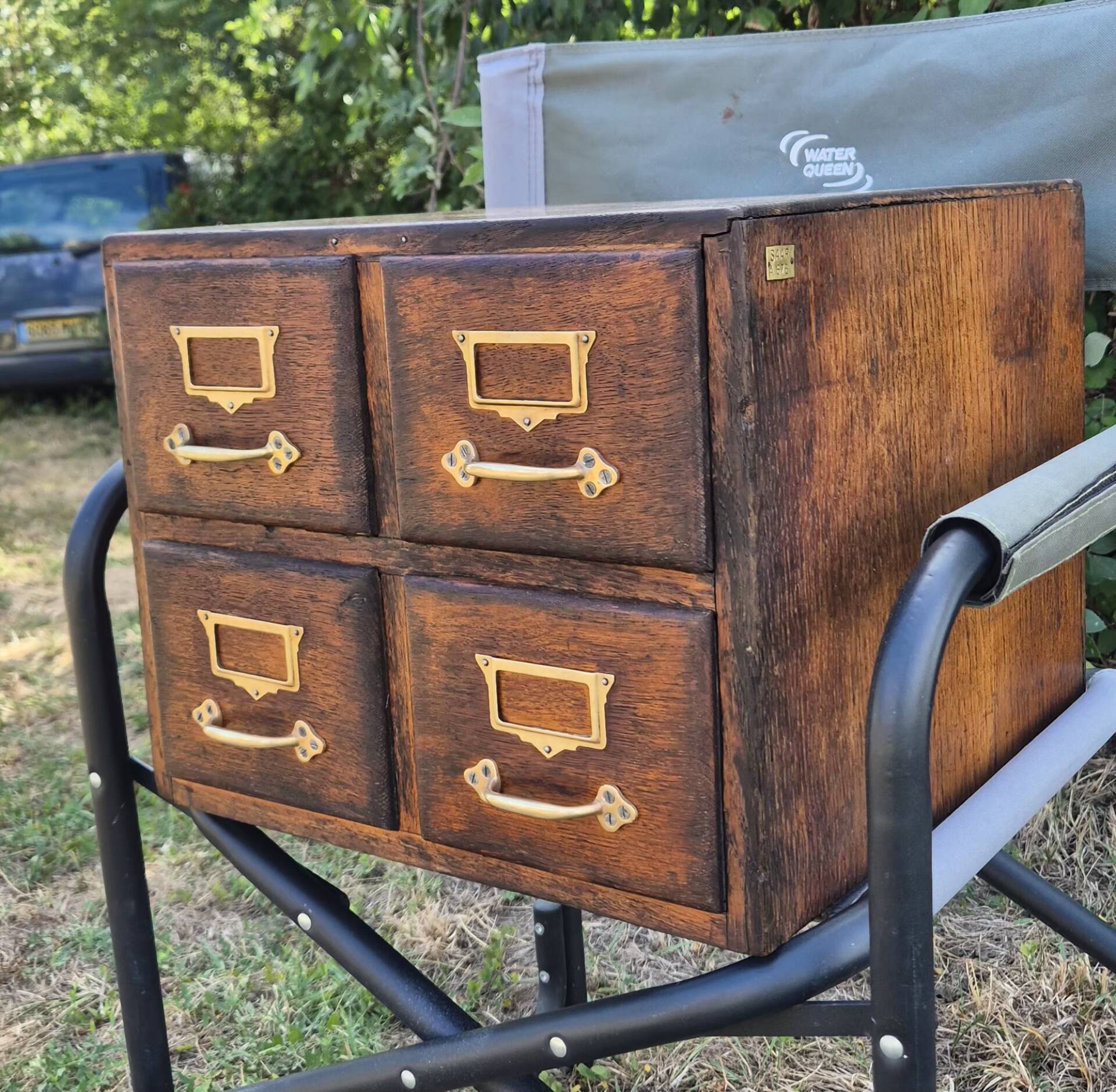 Workshop furniture made of oak and brass.
