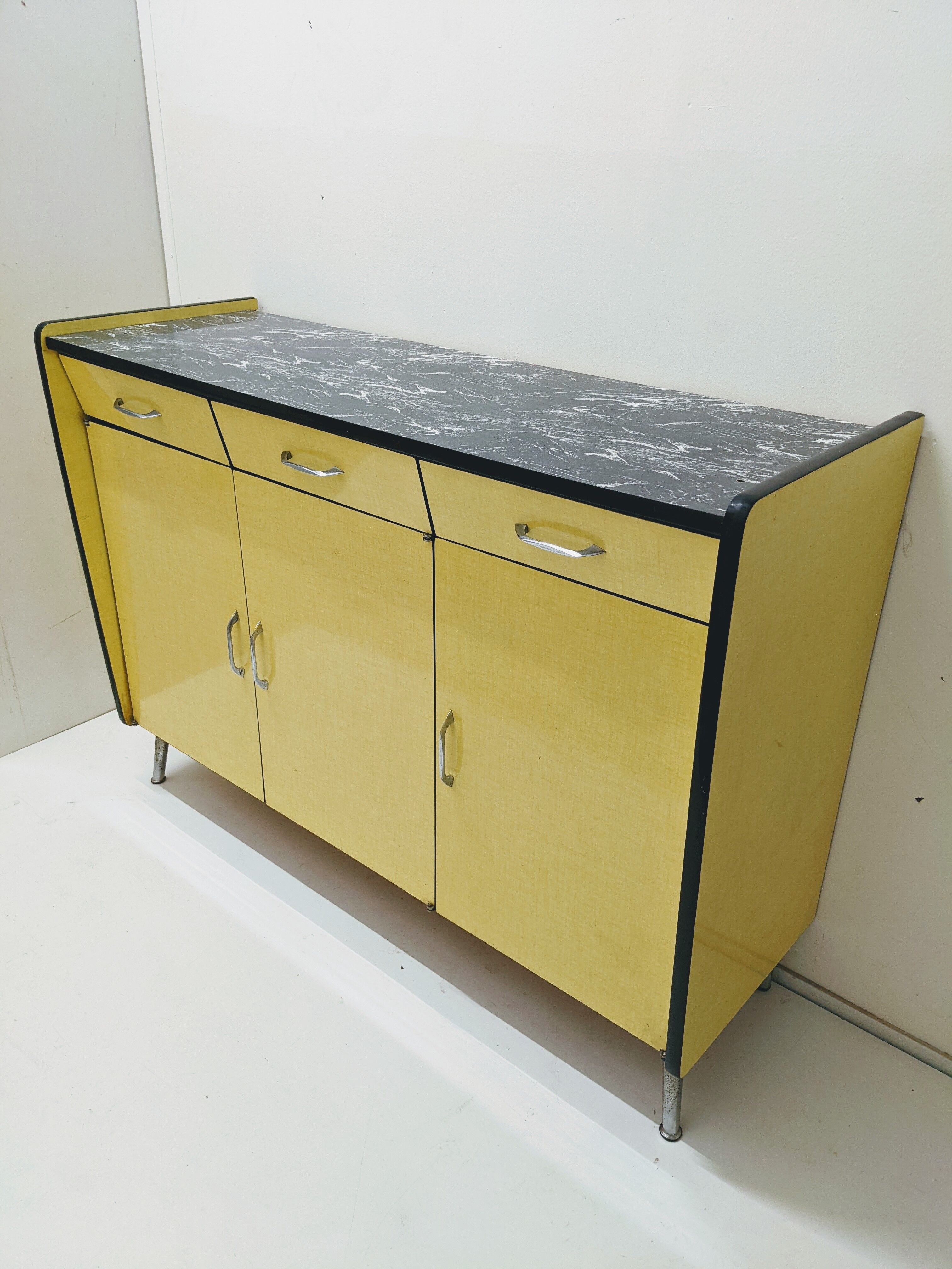 Vintage in-row sideboard in yellow formica