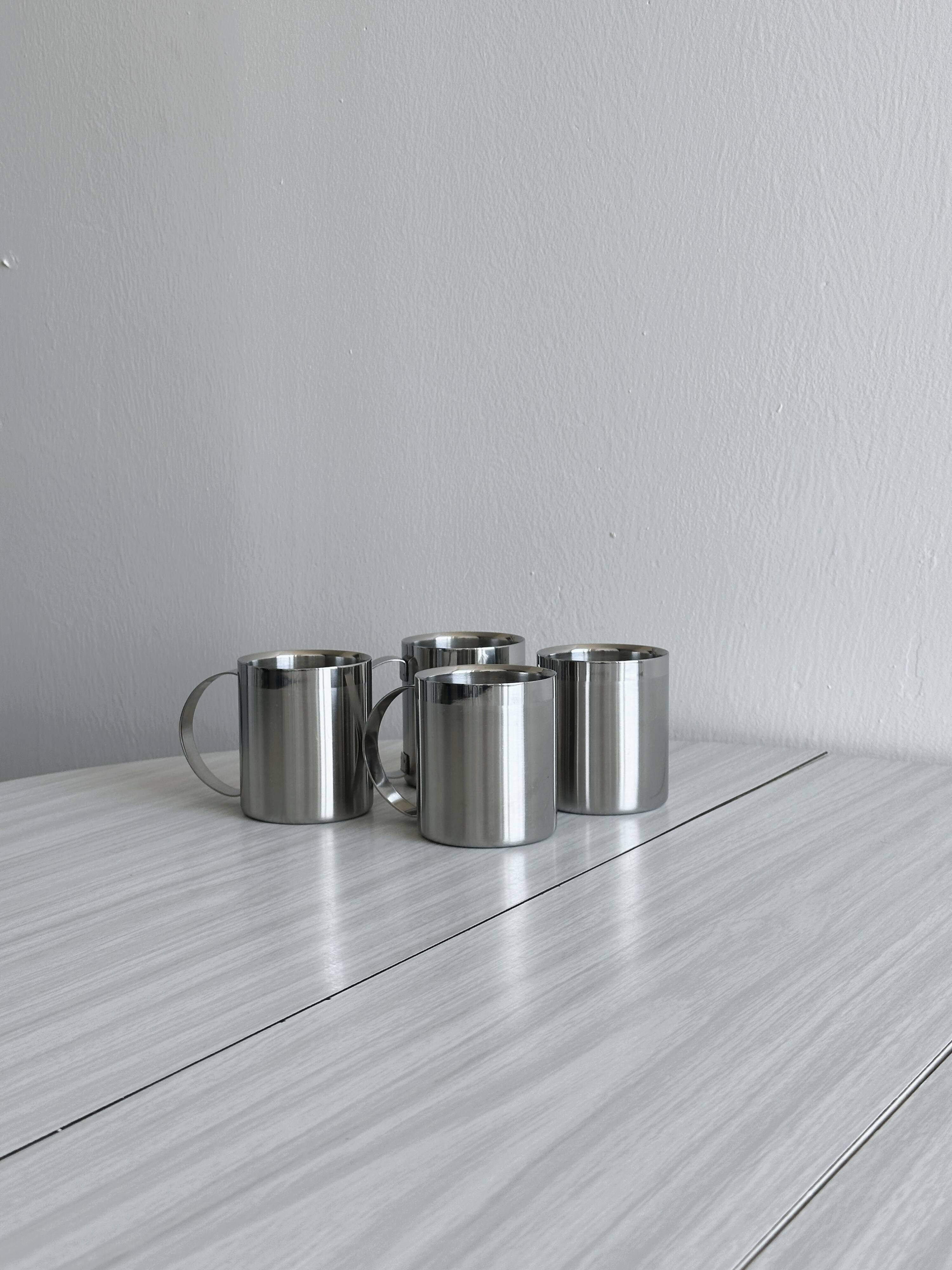 Set of 4 shiny stainless steel mugs