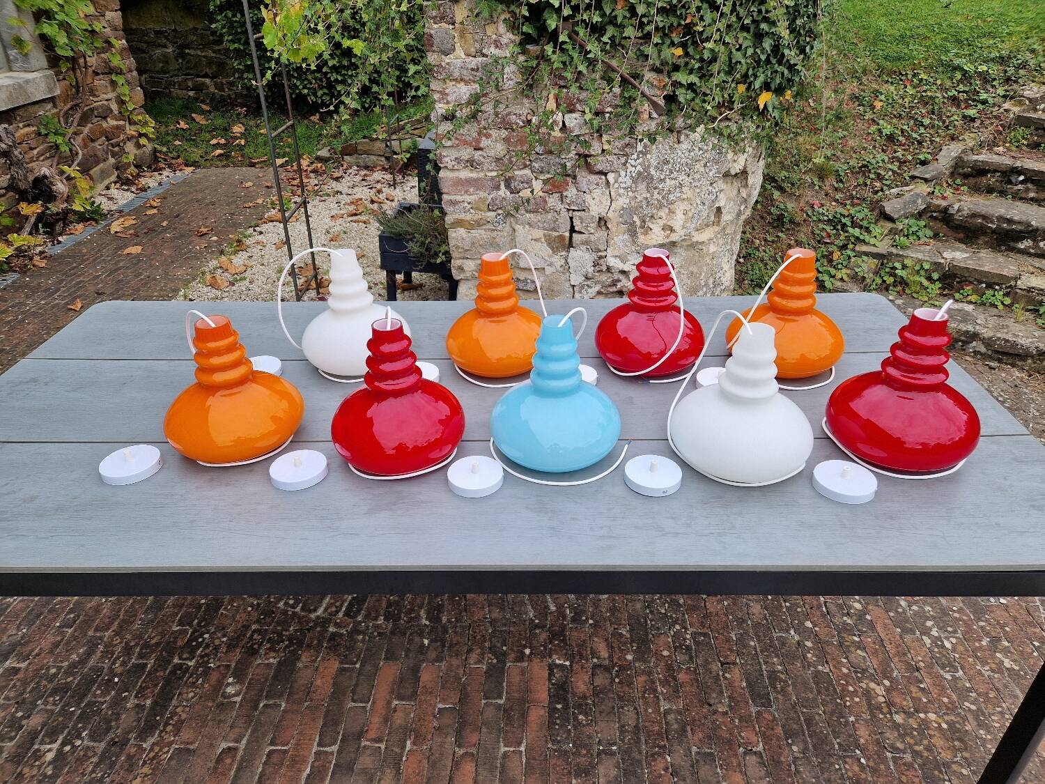 Trio of Space Age opaline pendant lights, Peill & Putzler, 1970
