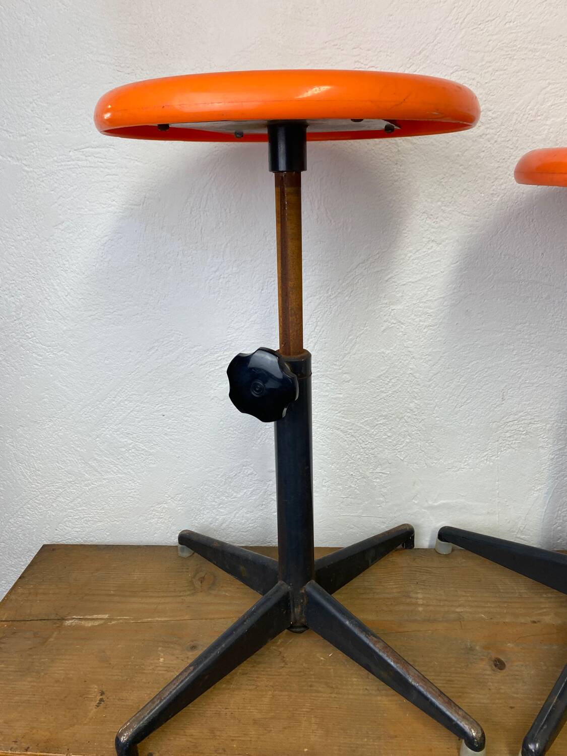 Two vintage industrial stools