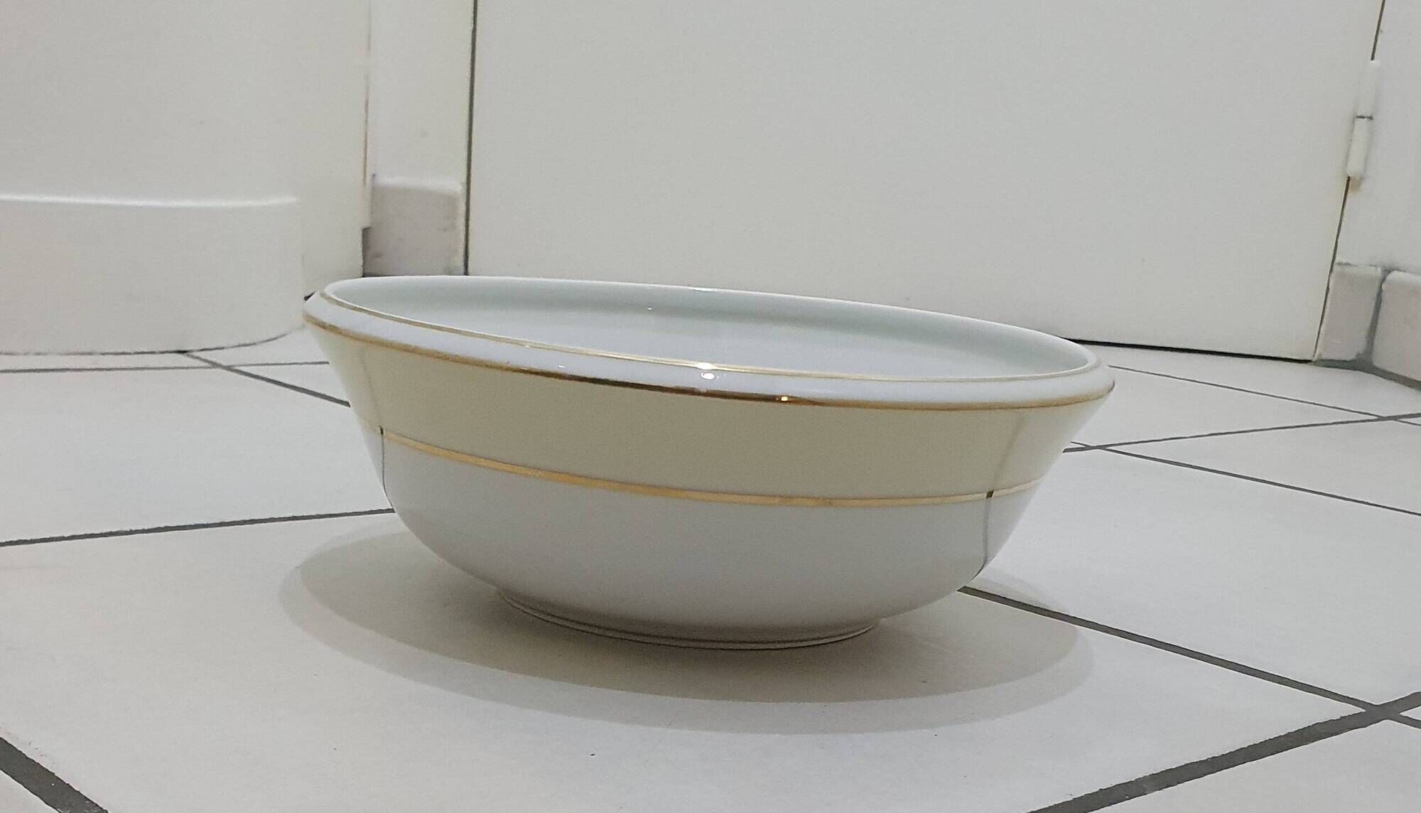 White and yellow porcelain dinner service with gold edging, Poral Limoges France