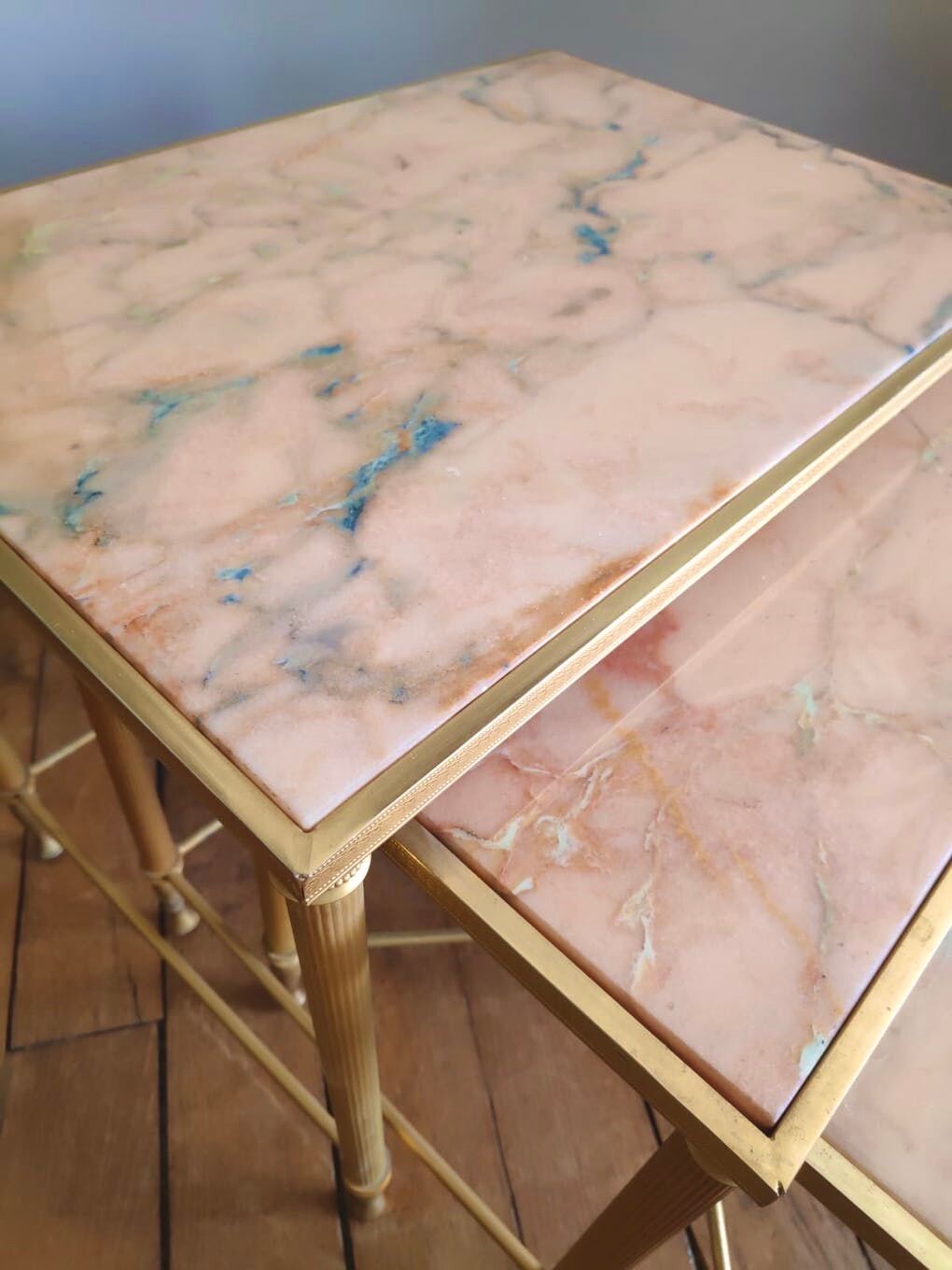 Tables in brass and pink marble