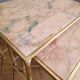 Tables in brass and pink marble