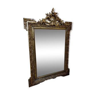 Old gilded stucco mirror